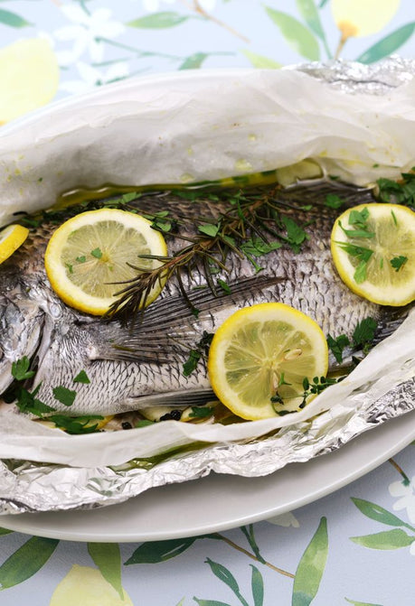 Whole sea bream cooked en papillote