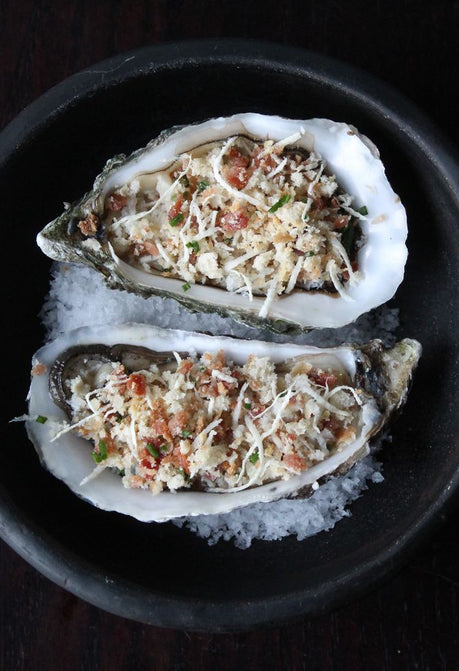 Oysters with cheese and bacon