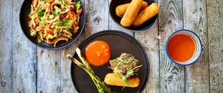 JERK-SPICED COD, PINEAPPLE GLAZE & CHARRED SWEETCORN-ONION CROQUETTES